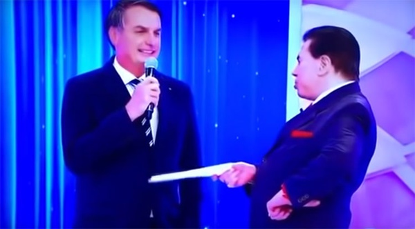 Com Silvio Santos, Bolsonaro fala de Previdência, faz piada e é contestado sobre armas