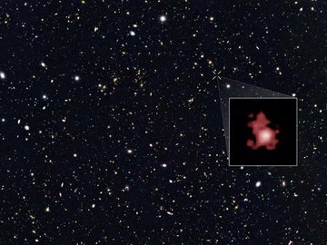 A galáxia GN-z11 (em destaque, à direita) é o objeto mais distante já detectado pelos astrônomos e existia quando o universo tinha apenas 400 milhões de anos.