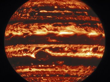 Júpiter em infravermelho, captado pelo observatório Gemini North, no Havaí: o planeta foi fotografado em três comprimentos diferentes de onda no mesmo momento.